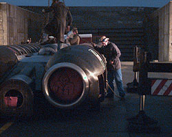 ThrustSSC is craned onto its trailer for the journey home