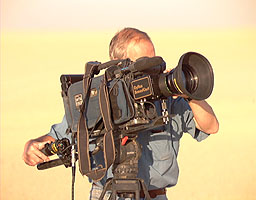 The BBC's cameraman, Tony, filming the microlight