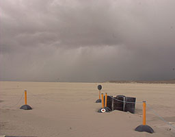 The storm front advances on the Desert Pits