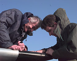 Adam Northcote-Wright and John Price set up the tail video camera before a run