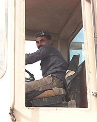 A member of the RJAF driving the Terex grader used during the evacuation on Tuesday