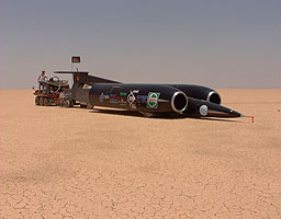 ThrustSSC is returned to the desert pits by a Supacat