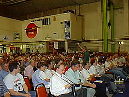 Nick Chapman displays a part of ThrustSSC in the auction