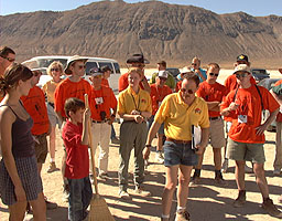 Members of the security team (orange shirts) at the briefing