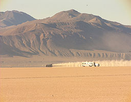 ThrustSSC rolls to a stand opposite the USAC timekeepers