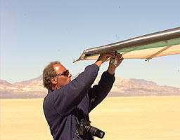 John Fack adjusts his wing-mounted camera