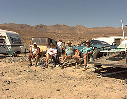 Spectators watching from the vantage point over the desert