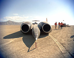 ThrustSSC is guarded by the Mach 1 Club at the Press Conference