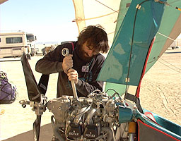 Richard Meredith-Hardy servicing a Pegasus microlight