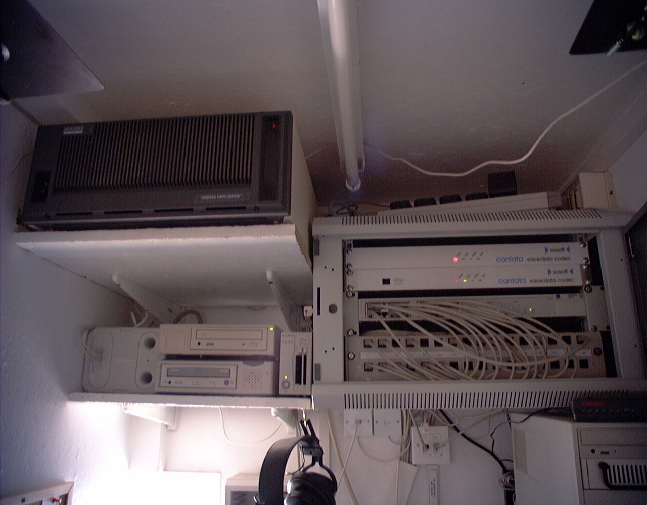 The Personal Earth Station (left) and CODECs (right) in the Pit Station's communications room